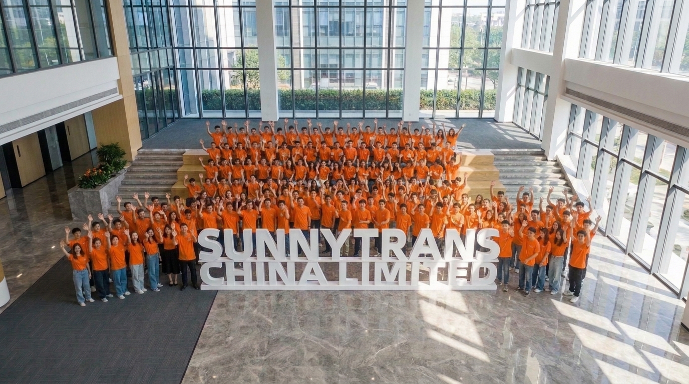 SUNNYTRANS CHINA LIMITED team group photo inside a bright modern atrium